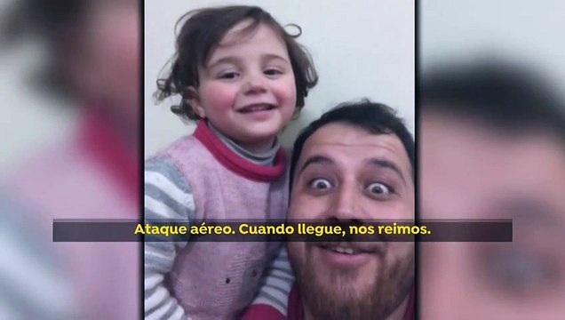 Como La vida es bella pero en Siria. Un padre juega con su hija con la explosión de las bombas.