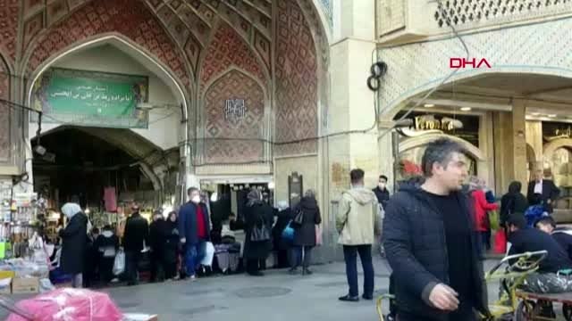 İran'da koronavirüs paniği maskeyle geziyorlar-2