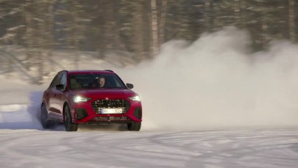 The new Audi RS Q3 in Tango Red Driving on ice