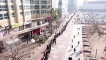 Corée du sud: des centaines de personnes font la queue pour acheter des masques