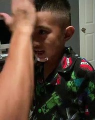 Distracting His Son While Pulling Tooth