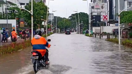 Torrential rains cause serious flooding in Indonesia's capital