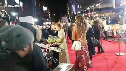 Kristin Scott Thomas and Sharon Horgan stop to sign autographs at 'Military Wives' film premiere