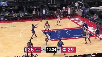 Daniel Dixon scores and draws the foul