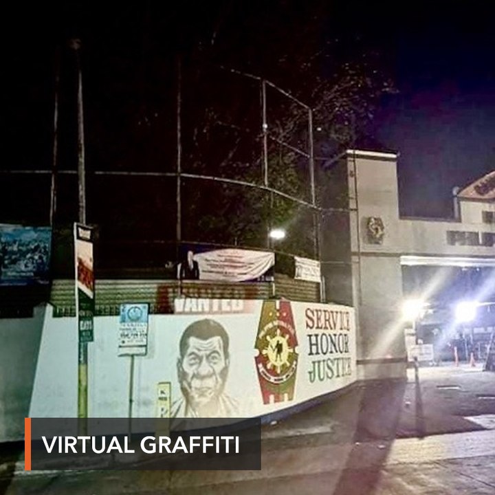 LOOK: Artists flash 'Duterte wanted' poster on Camp Crame