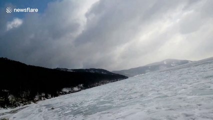 The sound of melting ice cracking on this Russian lake is very satisfying