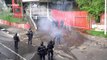 Colombia riot police use water cannon and stun grenades on protesting students