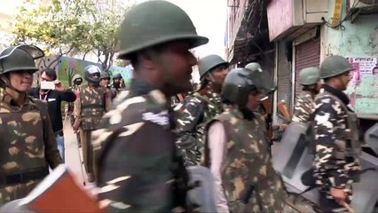 Thousands of paramilitary police deployed in New Delhi after deadly riots