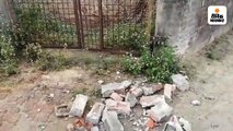 अराजकतत्वों ने गिराई कब्रिस्तान की दीवार; आक्रोशित हुए ग्रामीण, मौके पर भारी संख्या में पुलिस बल तैनात