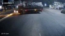 Pedestrian barely dodges collision between two lorries on south Indian road