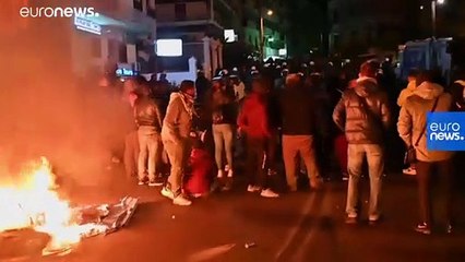 Residents clash with police on Greek islands over building of new migrant detention camps