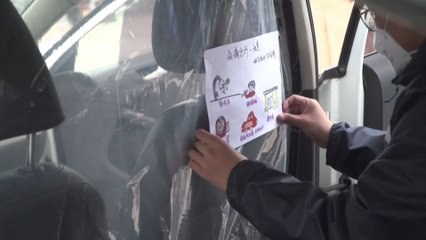China’s ride-hailing drivers install plastic shields to prevent coronavirus infection