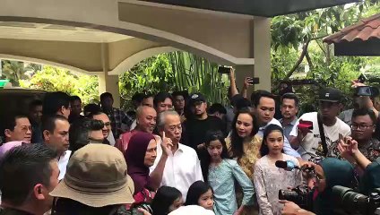 Tan Sri Muhyiddin as he receives the news