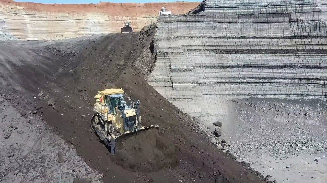 Two Cat D9T Dozers Building A Ramp In Coal Mine