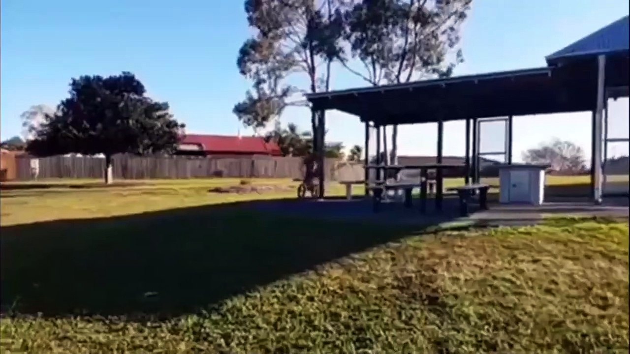 Little Boy Jumps A Ramp With His Bike