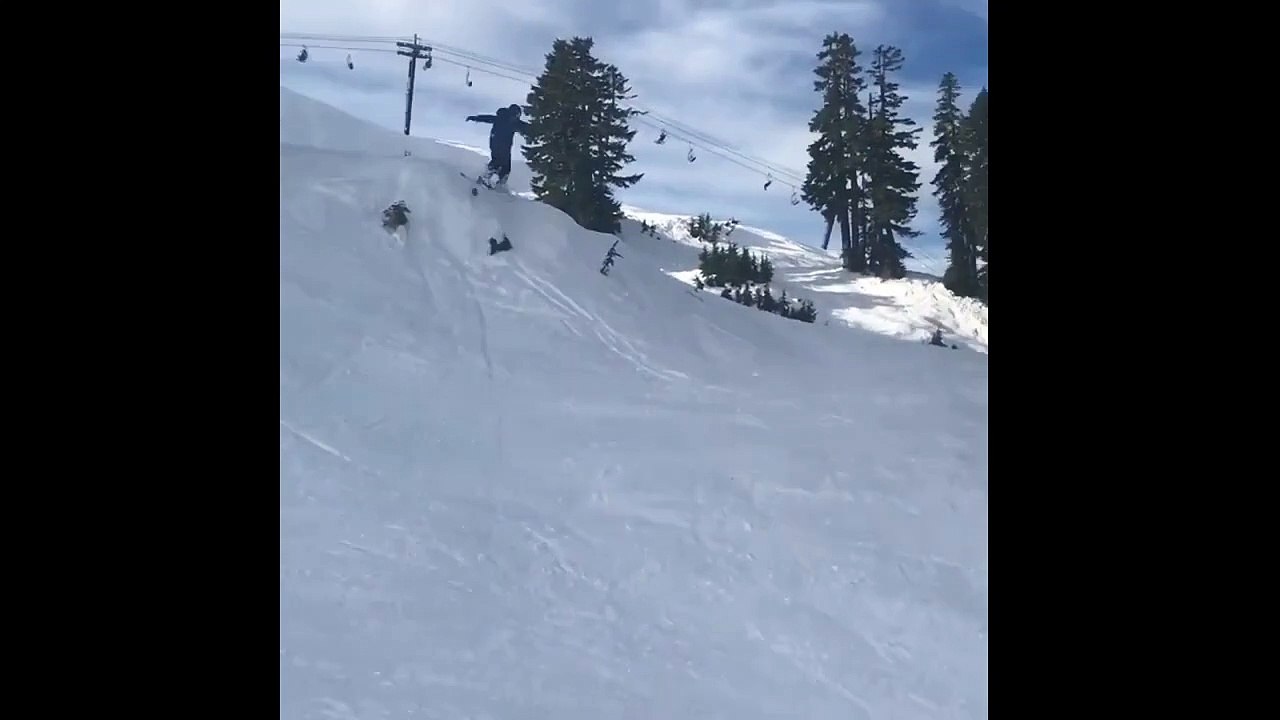 Skier Goes Off A Hill And His Skis Fall Off