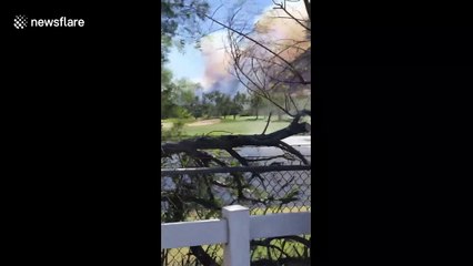 Helicopter gathers water amid Mann fire in Southern California