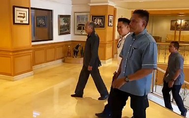 Out of PM's office, Dr M goes to work as usual