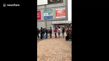 Hundreds of locals in Japan queue up 'every day' to purchase face masks amid COVID-19 outbreak