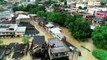 Drone mostra o bairro Vila Rica, em Cariacica, tomado pela água da chuva