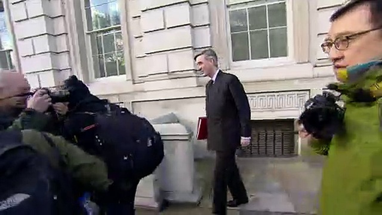 Cameraman falls during media scrum after Cobra meeting
