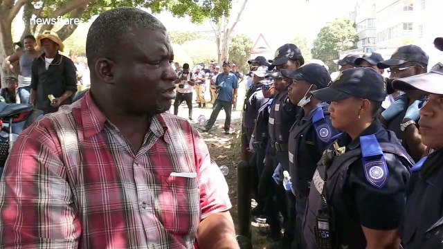 Scenes of despair and violence as migrants removed from central Cape Town