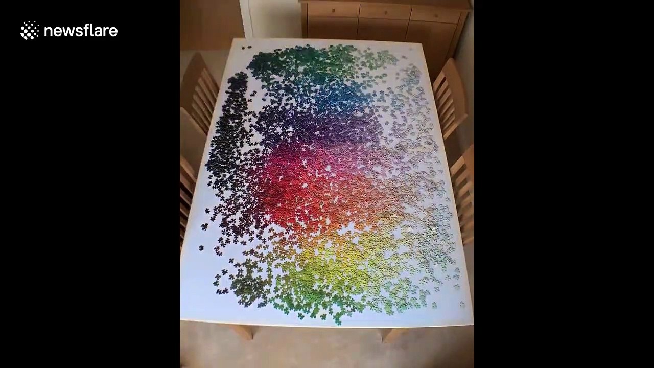 Satisfying timelapse shows completion of rainbow-coloured jigsaw