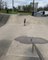 Three-Year-Old Girl Expertly Skates in Skate Park