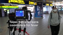 Coronavirus: Temperature checks in Taiwan metro