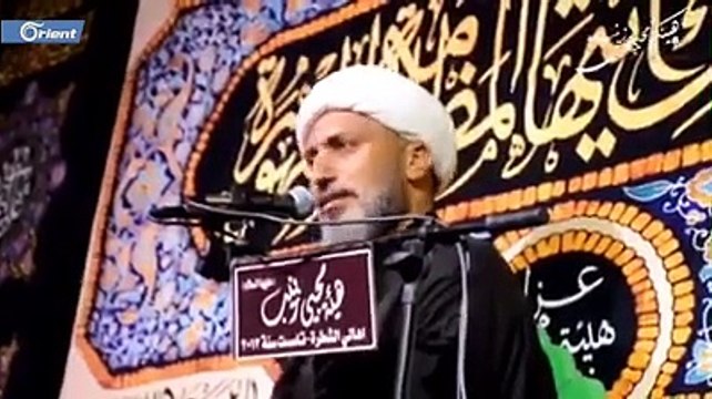 مُعمّم شيعي عراقي يتحدى فيروس كورونا بتقبيل مريض بشرط أن يكون محباً للحسين