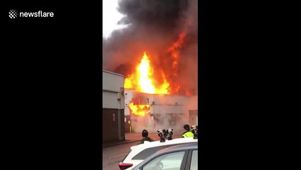 Explosive fire rages through industrial estate in Reading, southern England