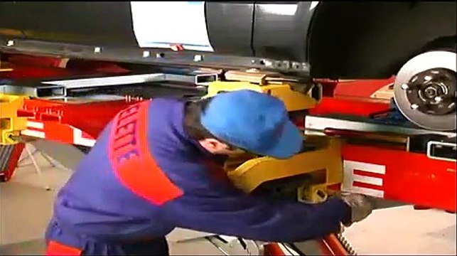 Honda Civic body repair on a Celette car frame machine, setup with universal jig, measuring system