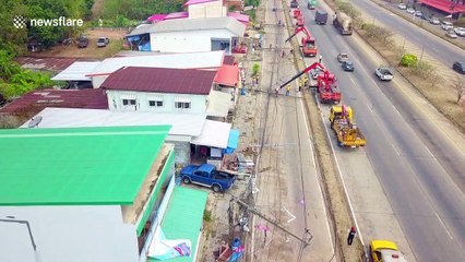 Storm causes string of power poles to collapse in northern Thailand