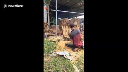 Vietnamese man makes beautiful wooden statue with chainsaw and chisel