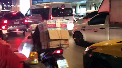 Vendor sells face masks and tissues on Thai street as even hospitals run out of them during COVID-19 outbreak