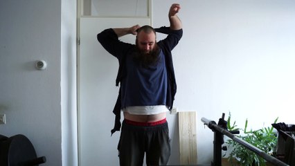 Ripping an old sweater with damaged sleeves apart