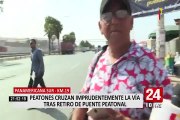 Peatones cruzan imprudentemente la vía tras retiro de puente peatonal