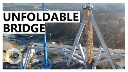 Innovative bridge built vertically, unfolds like an umbrella
