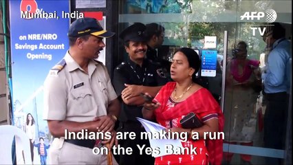 Customers of India's Yes bank queue after withdrawals limited
