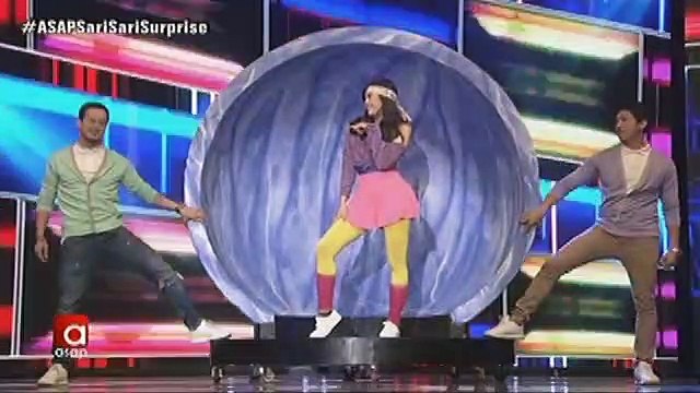 Liza and Enrique together with Janella, Elmo, Sam, Joshua and Jerome in a disco-themed opening numbe