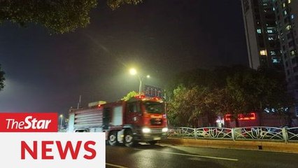 China hotel collapses, dozens trapped