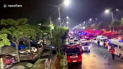 Firefighters rescue suspected coronavirus patients after hotel in southern China collapses