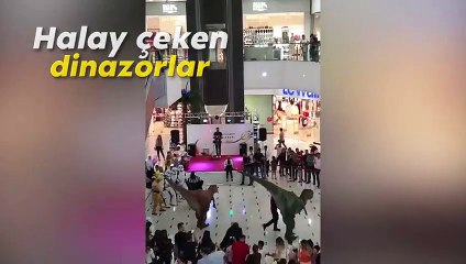 AVM'de halay çeken dinozor ve süper kahramanlar