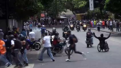 Police and protesters clash in Venezuela