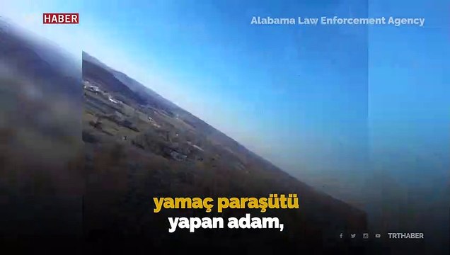 Yamaç paraşütü yaparken ağaca takılan adam helikopterle kurtarıldı