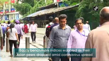 Equity indices flat in volatile trading, Yes Bank jumps 20 pc