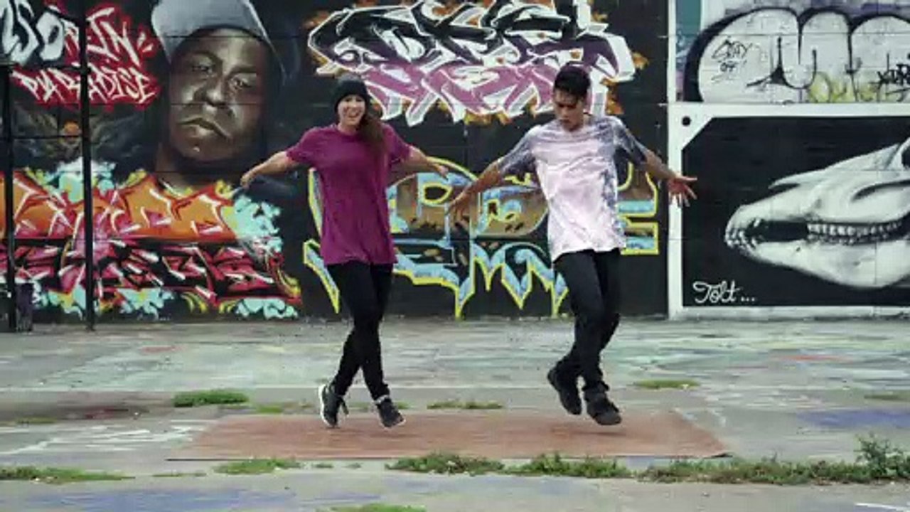 male-and-female-break-dancers-in-urban-setting_4k1bpq_qe__D