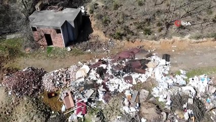 Ormanlık alana bırakılan tonlarca inşaat atığı havadan görüntülendi