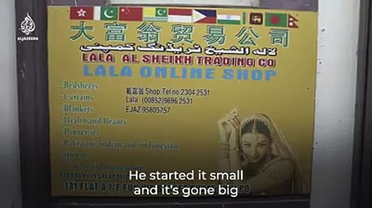 Coronavirus - Pakistani family hands out masks in Hong Kong