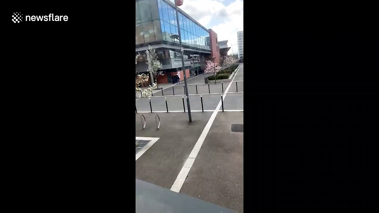 Armed police seen entering Evry University in Paris after reports of 'man armed with bomb'